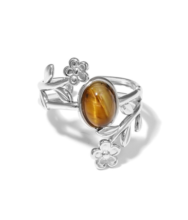 Anillo plateado con detalles botánicos y piedra