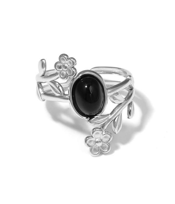Anillo plateado con detalles botánicos y piedra