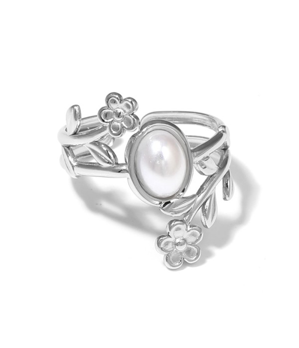 Anillo plateado con detalles botánicos y piedra