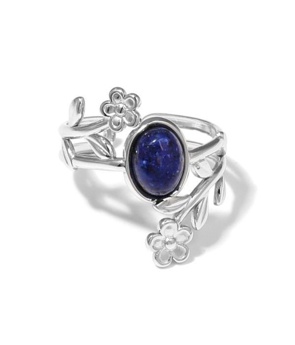 Anillo plateado con detalles botánicos y piedra