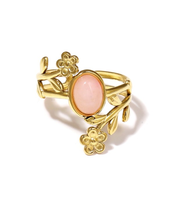 Anillo dorado con detalles botánicos y piedra