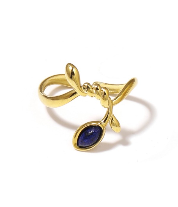 Anillo dorado con líneas entrelazadas y piedra