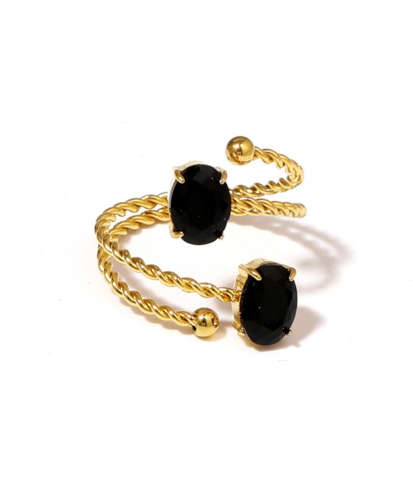 Anillo dorado con diseño de cordón y circonitas...