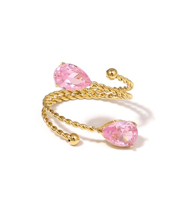 Anillo dorado con diseño de cordón y circonitas en forma de gota