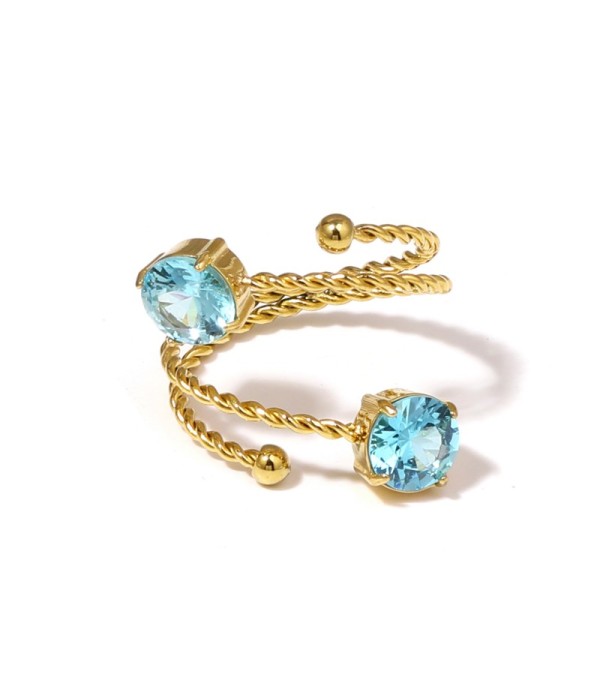 Anillo dorado con diseño de cordón y circonitas...