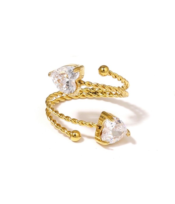 Anillo dorado con diseño de cordón y circonitas en forma...
