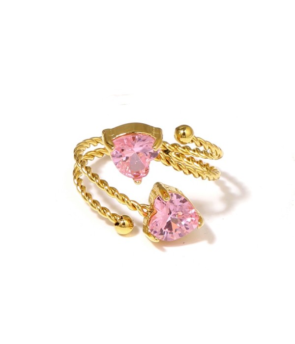 Anillo dorado con diseño de cordón y circonitas en forma de corazón