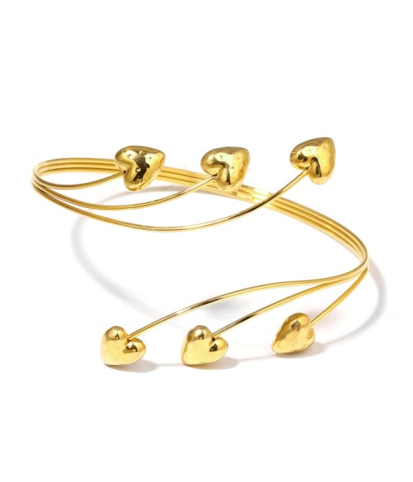 Brazalete de brazo dorado con corazones