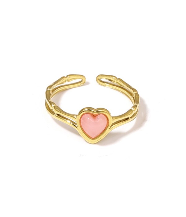 Anillo dorado de corazón con piedra