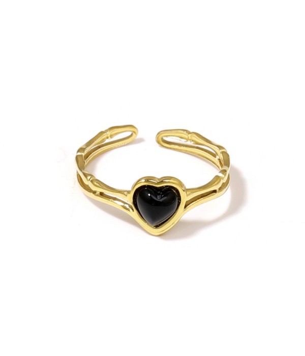 Anillo dorado de corazón con piedra
