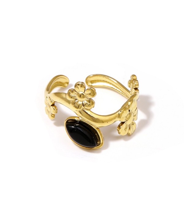 Anillo dorado de flores con piedra