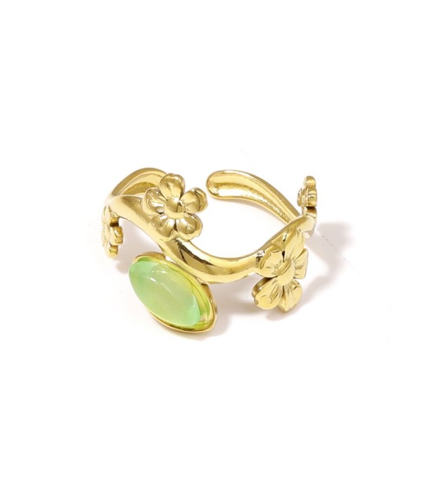 Anillo dorado de flores con piedra