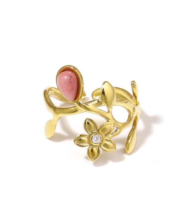 Anillo dorado de flores y hojas con piedra