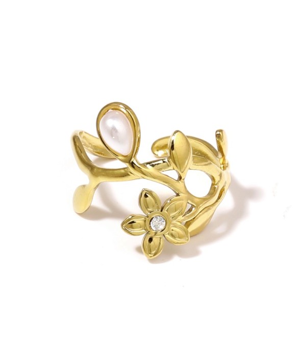 Anillo dorado de flores y hojas con piedra