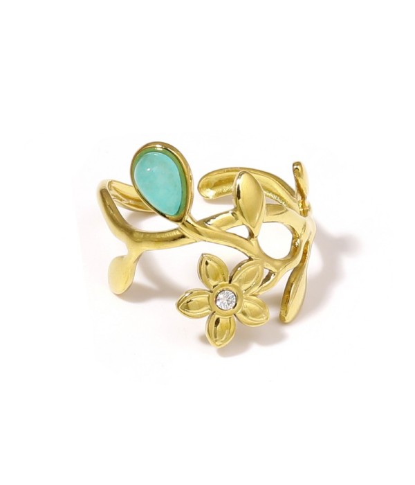 Anillo dorado de flores y hojas con piedra