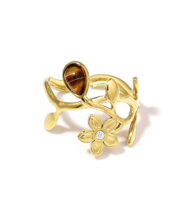 Anillo dorado de flores y hojas con piedra