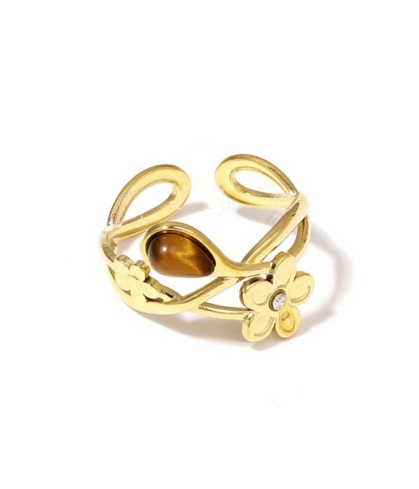 Anillo dorado de flores con piedra