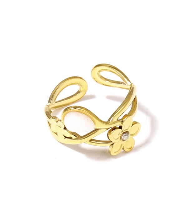 Anillo dorado de flores con piedra