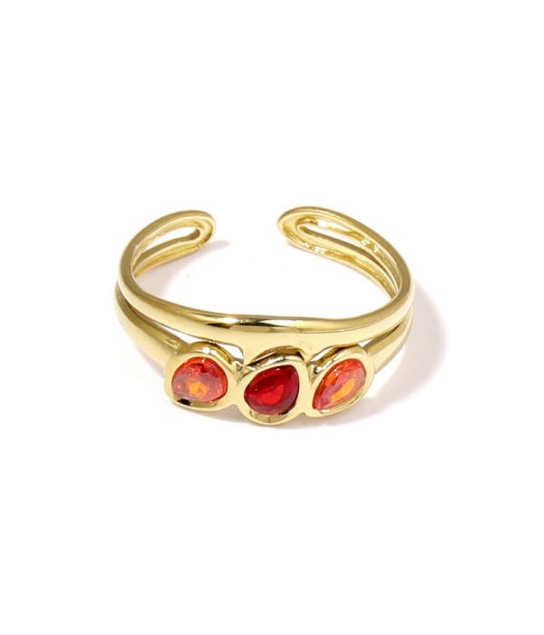 Anillo dorado con tres circonitas de colores