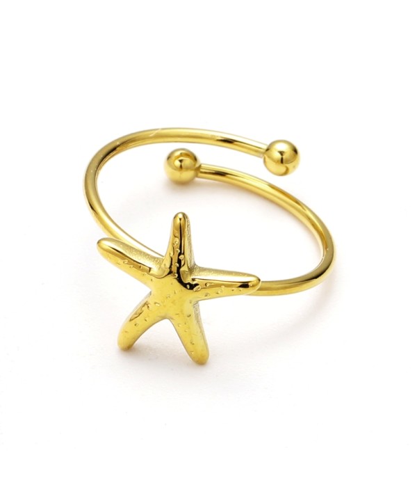 Anillo abierto dorado de estrella del mar