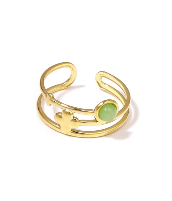 Anillo dorado con trébol de cuatro hojas y piedra