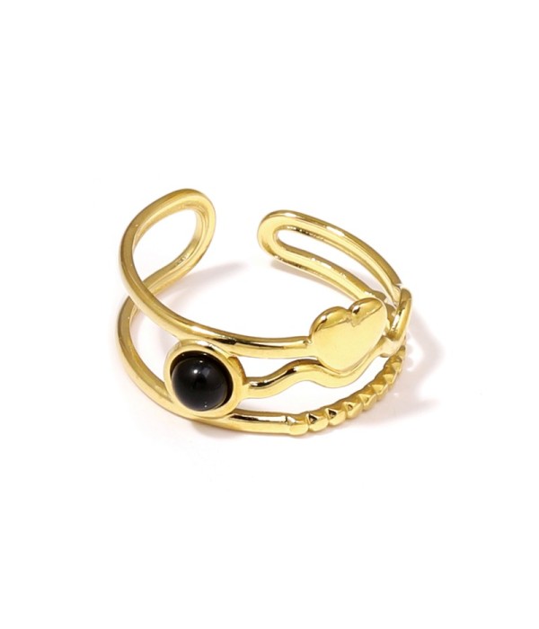 Anillo dorado con corazón y piedra