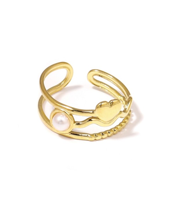 Anillo dorado con corazón y piedra