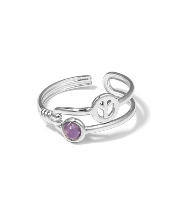 Anillo plateado con símbolo de la paz y piedra