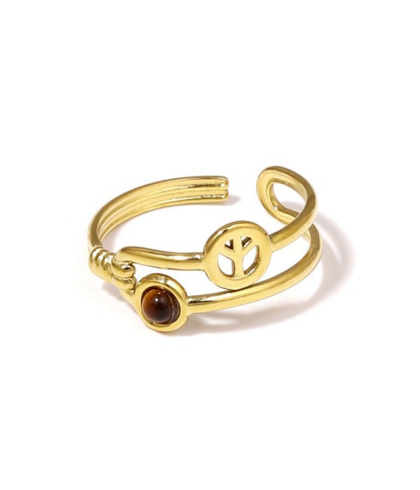 Anillo dorado con símbolo de la paz y piedra