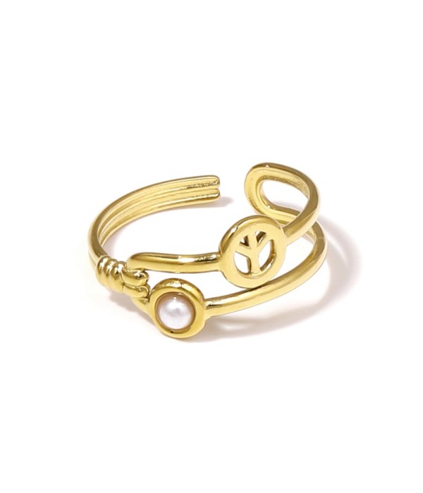 Anillo dorado con símbolo de la paz y piedra
