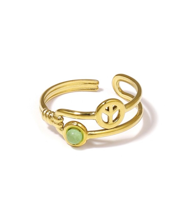 Anillo dorado con símbolo de la paz y piedra