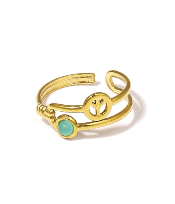 Anillo dorado con símbolo de la paz y piedra