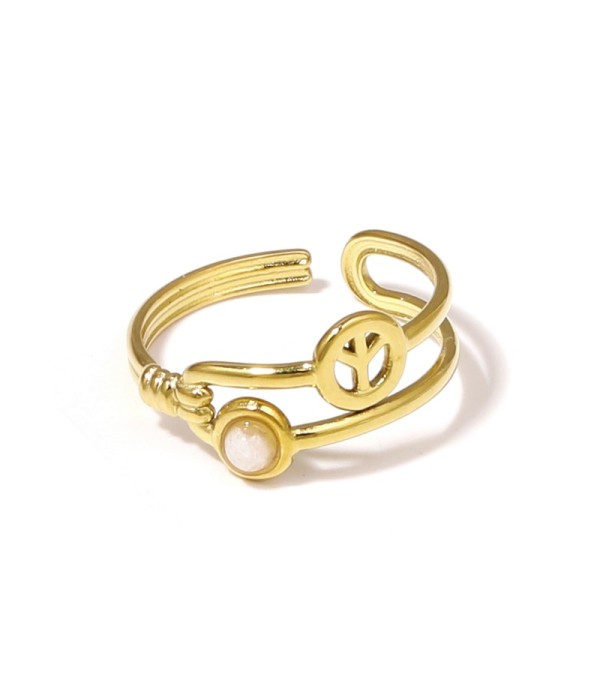 Anillo dorado con símbolo de la paz y piedra