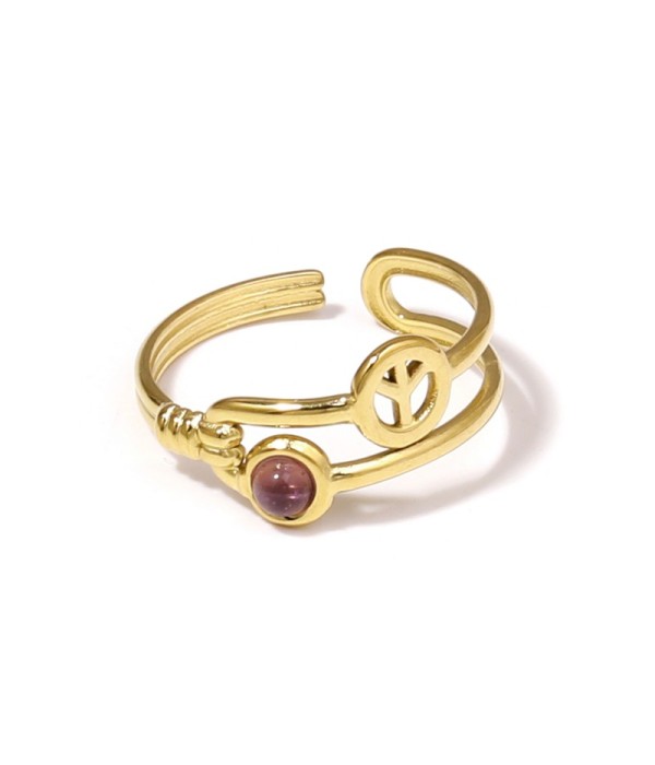 Anillo dorado con símbolo de la paz y piedra