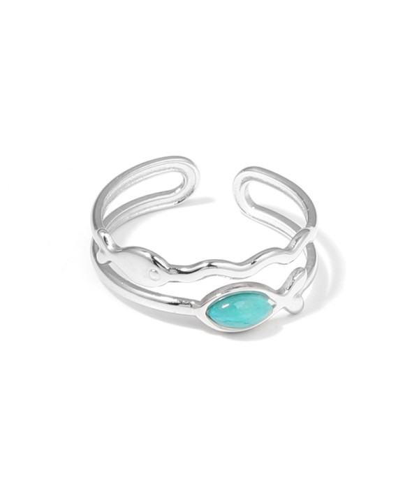 Anillo plateado con siluetas de peces y piedra
