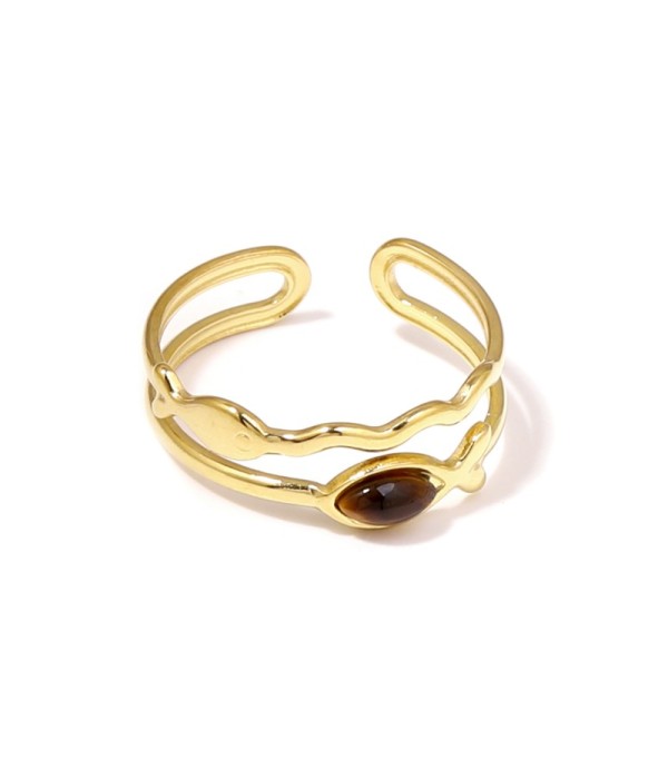 Anillo dorado con siluetas de peces y piedra