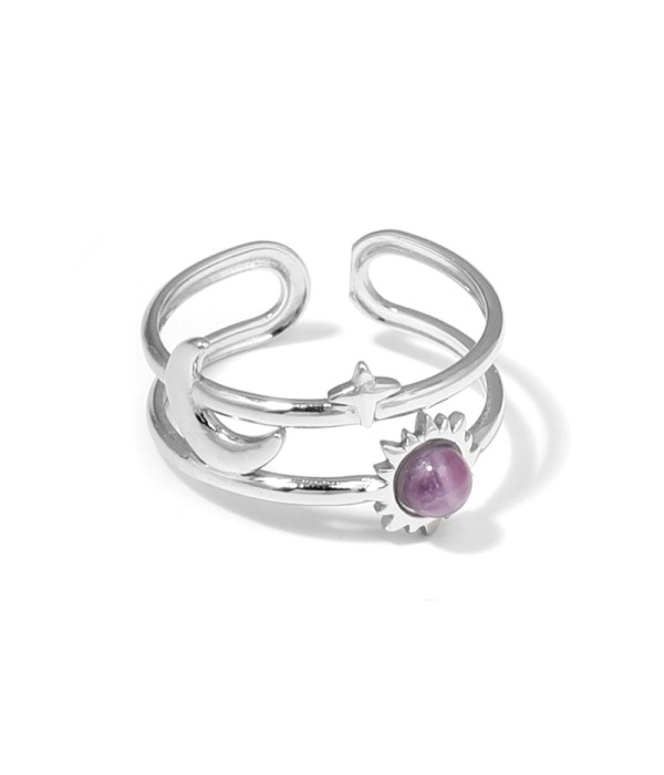 Anillo plateado de temática cósmica con piedra