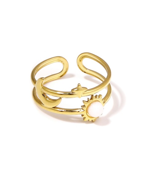 Anillo dorado de temática cósmica con piedra