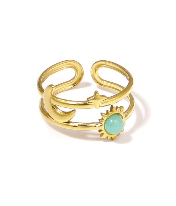 Anillo dorado de temática cósmica con piedra