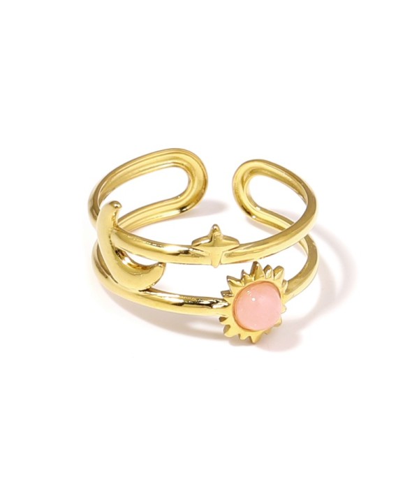 Anillo dorado de temática cósmica con piedra