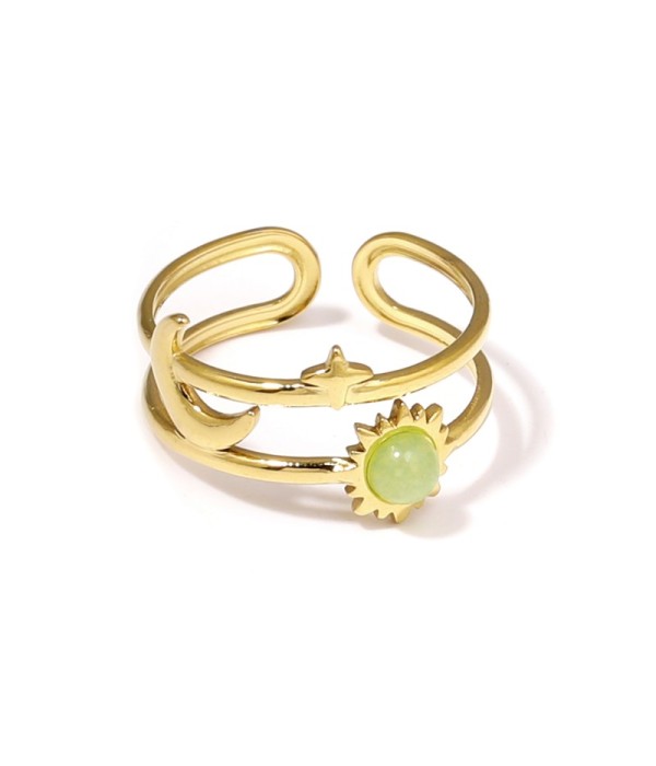 Anillo dorado de temática cósmica con piedra