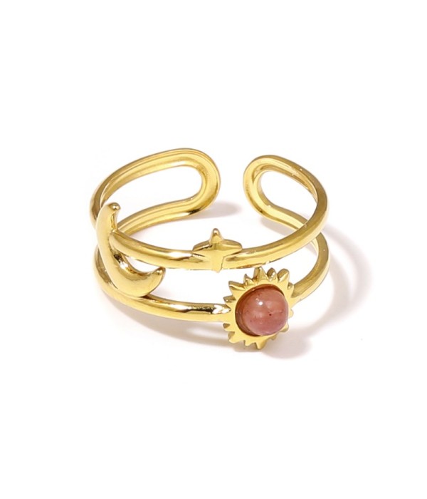 Anillo dorado de temática cósmica con piedra