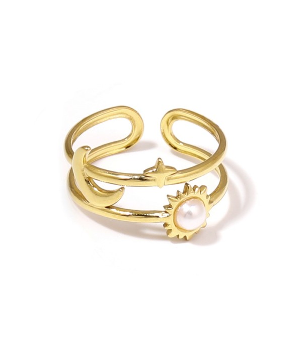Anillo dorado de temática cósmica con piedra