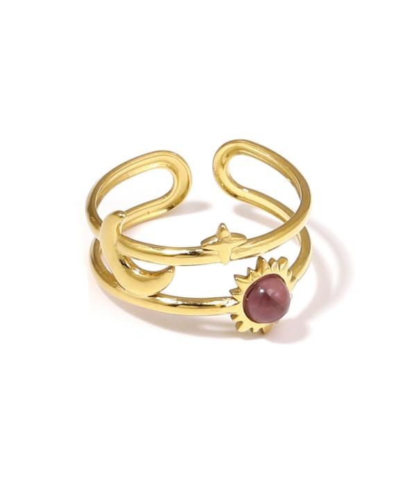 Anillo dorado de temática cósmica con piedra