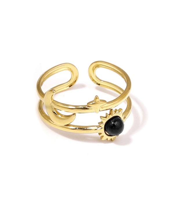 Anillo dorado de temática cósmica con piedra