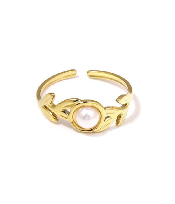 Anillo dorado con diseño de hojas y piedra