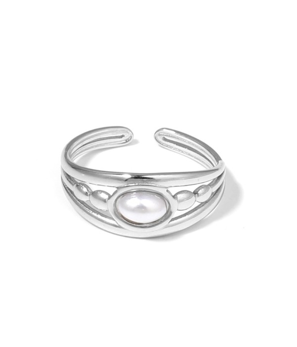 Anillo plateado con relieves ovalados y piedra...
