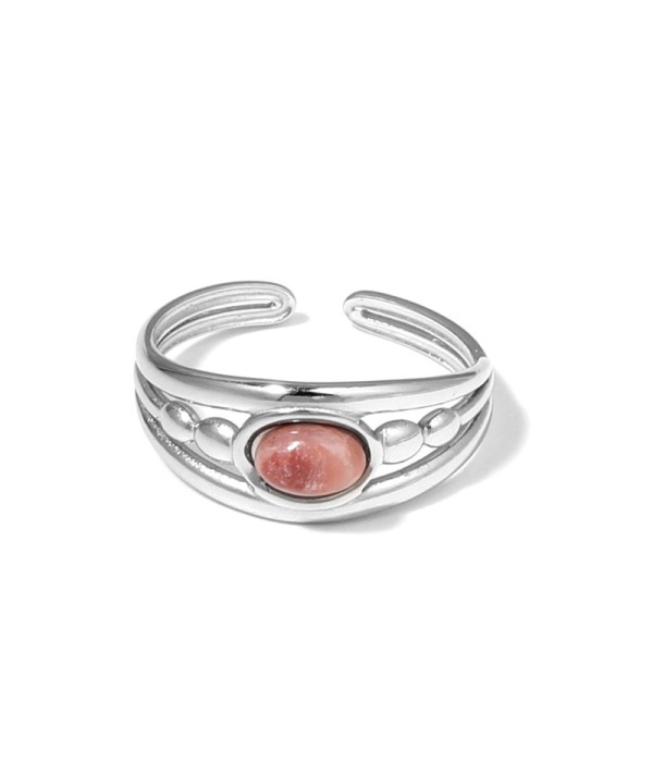 Anillo plateado con relieves ovalados y piedra ovalada