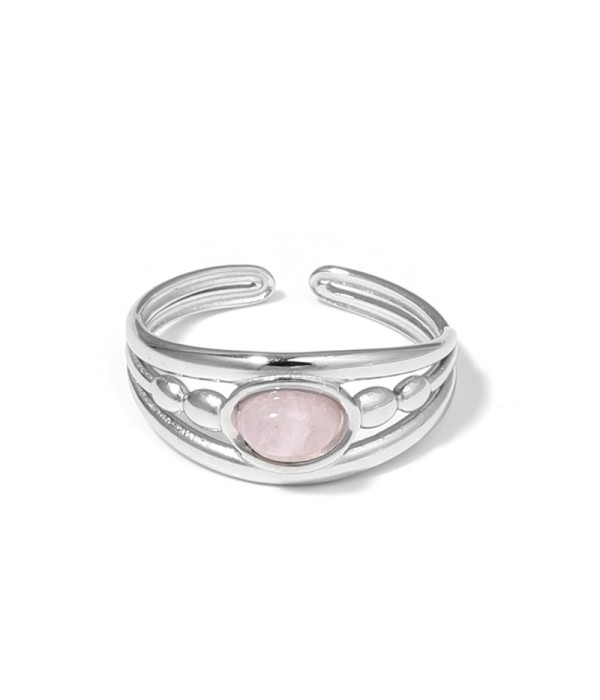 Anillo plateado con relieves ovalados y piedra...
