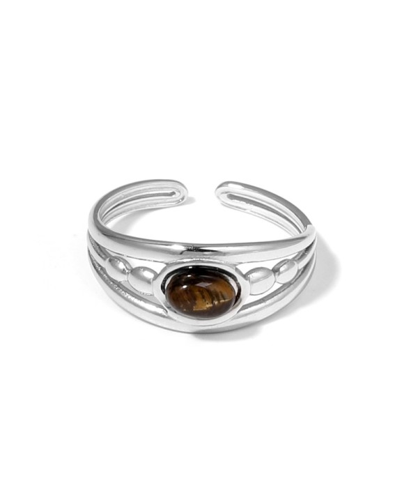 Anillo plateado con relieves ovalados y piedra ovalada